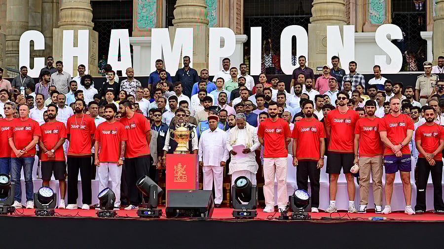 <div class="paragraphs"><p>Chief Minister Siddaramaiah, Deputy Chief Minister D K Shivakumar and Governor Thaawarchand Gehlot take part in the felicitation programme for RCB players organised in front of Vidhana Soudha on Wednesday. </p></div>