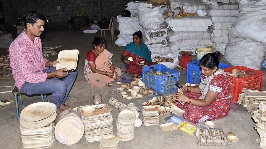 <div class="paragraphs"><p>Workers in areca sheath plate manufacturing industry in Shivamogga. </p></div>