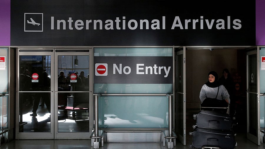 <div class="paragraphs"><p>An international traveler in a US airport</p></div>