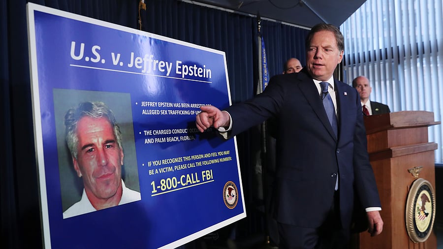 <div class="paragraphs"><p>Geoffrey Berman, United States Attorney for the Southern District of New York, points to a photograph of Jeffrey Epstein as he announces the financier's charges of sex trafficking of minors and conspiracy to commit sex trafficking of minors, in New York, US, July 8, 2019.</p></div>