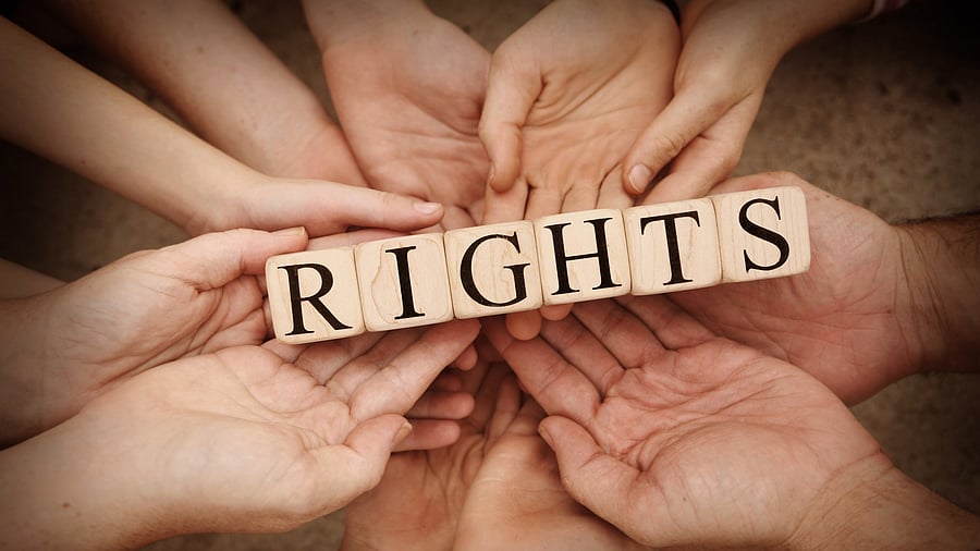 <div class="paragraphs"><p>Lots of people all holding blocks spelling out Rights</p></div><div class="paragraphs"><p><br></p></div>
