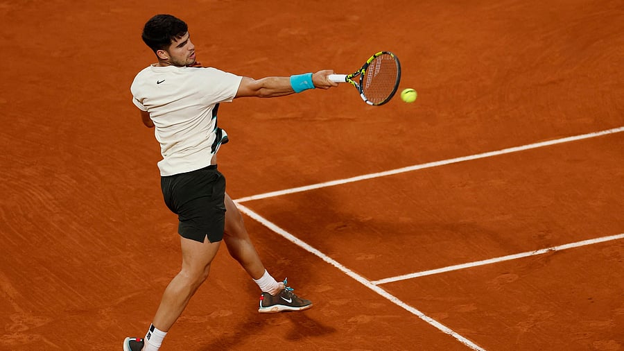 <div class="paragraphs"><p>Alcaraz in action during his semi final match against Italy's Lorenzo Musetti.</p></div>