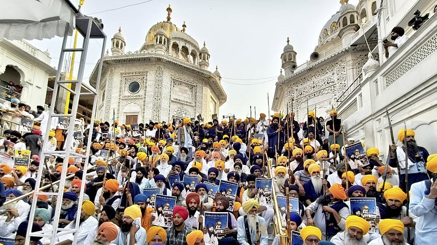<div class="paragraphs"><p>Activists from various Sikh organisations holding placards gather at the Golden Temple to offer prayers on the occasion of the 41st anniversary of Operation Blue Star, in Amritsar, Friday, June 6, 2025. </p></div>