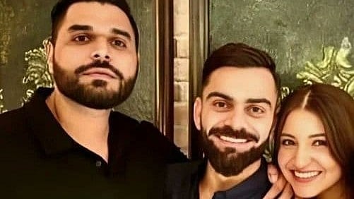 <div class="paragraphs"><p>An undated photograph of Nikhil Sosale with Virat Kohli and Anushka Sharma.</p></div>