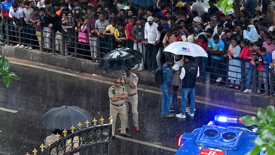 <div class="paragraphs"><p>Bengaluru City Police Commissioner B Dayananda, now suspended, is seen outside the main gate of M Chinnaswamy Stadium on the day of the stampede. An ambulance leaves the stadium carrying injured fans on Wednesday in Bengaluru. </p></div>