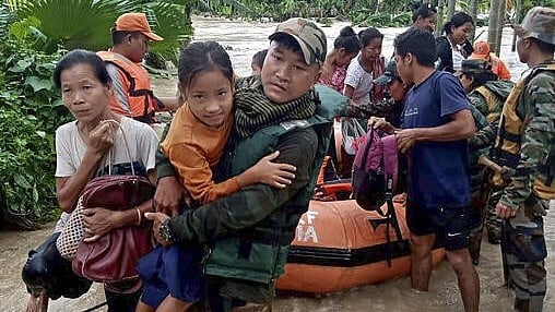 <div class="paragraphs"><p>An Assam Rifles personnel carries a girl during a rescue operation in a flood-affected area in  Arunachal Pradesh.</p></div>