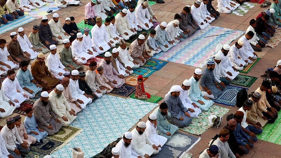 <div class="paragraphs"><p>Muslims offer prayers at Jama Masjid on the occasion of Eid al-Adha, in the old quarters of Delhi.</p></div>