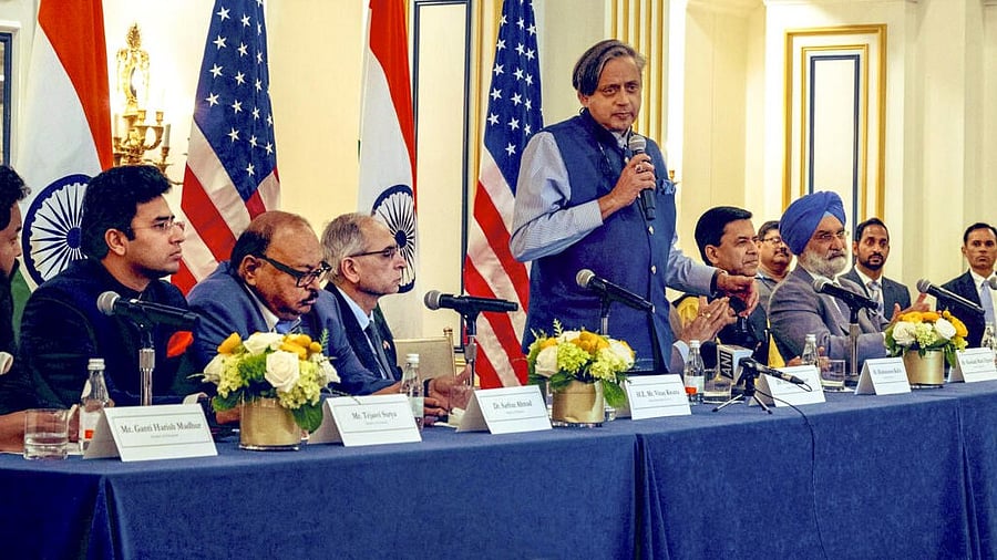 <div class="paragraphs"><p>In this image released by @ShashiTharoor via X on June 7, 2025, A multi-party delegation of India, led by Congress MP Shashi Tharoor, during an interaction with members of the Indian community, in USA.</p></div>