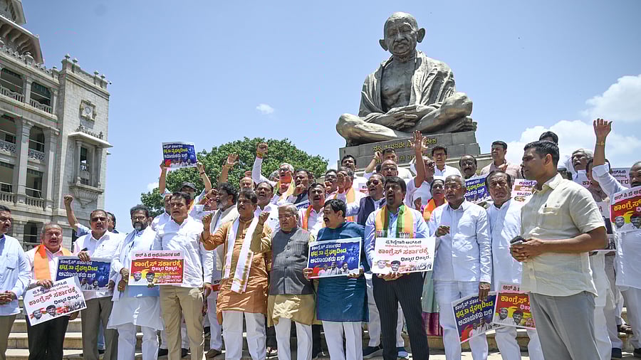 <div class="paragraphs"><p>BJP leaders hold a protest in Bengaluru, June 8, 2025.</p></div>