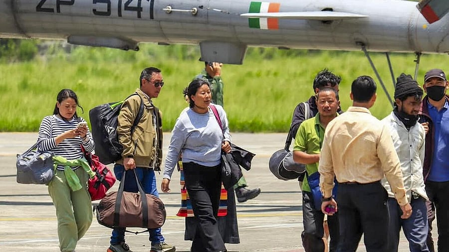 <div class="paragraphs"><p> People being evacuated from the landslide-hit Chaten area, in Sikkim.</p></div>