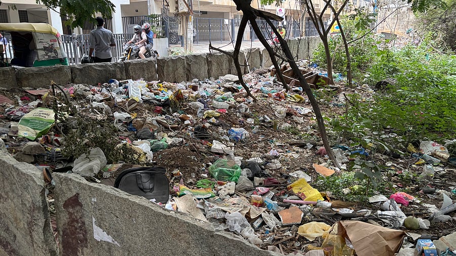 <div class="paragraphs"><p>A vacant plot at 13th Cross in Babusapalya, situated close to a school with over 2,000 students, is filled with garbage. Garbage tax applies even to vacant plots.</p></div>