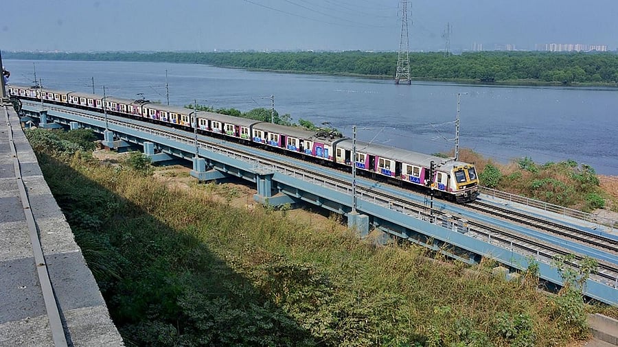 <div class="paragraphs"><p>Mumbai local on the Mumbra Creek Bridge</p></div>