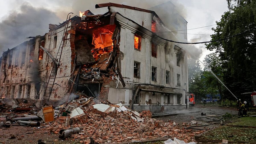 <div class="paragraphs"><p>Firefighters work at the site of a building hit by a Russian drone strike, amid Russia's attack on Ukraine.</p></div>