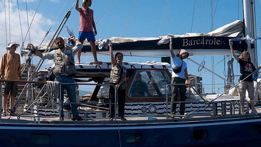 <div class="paragraphs"><p>Activist Greta Thunberg stands aboard the aid ship Madleen</p></div>