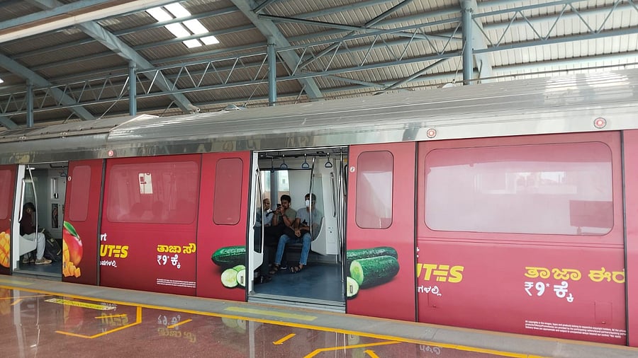 <div class="paragraphs"><p>A metro train wrapped with an advertisement on Monday. </p></div>
