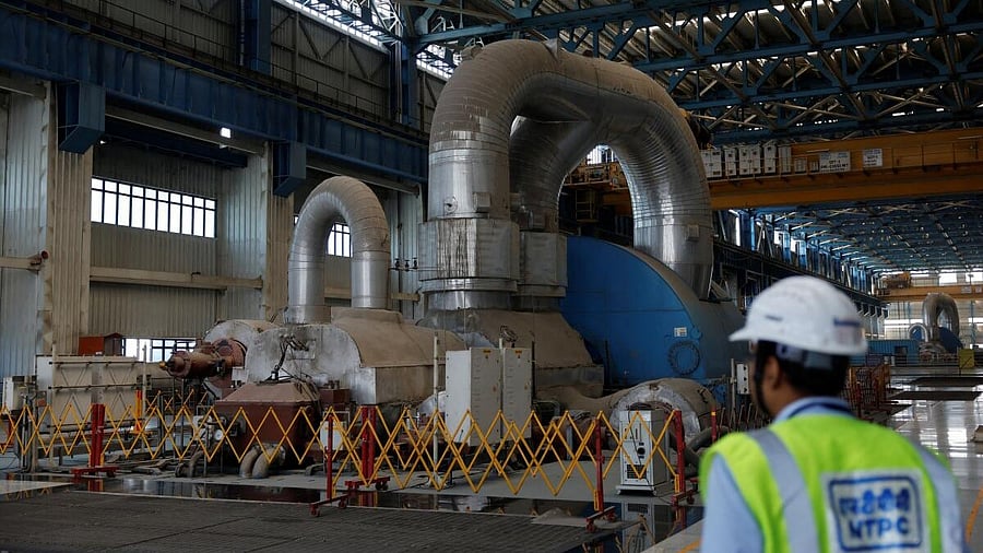 <div class="paragraphs"><p>An employee is seen inside the NTPC (National Thermal Power Corporation) power plant in Solapur</p><p></p></div>