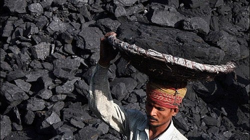 <div class="paragraphs"><p>Image showing a worker transporting coal. For representational purposes.</p></div>