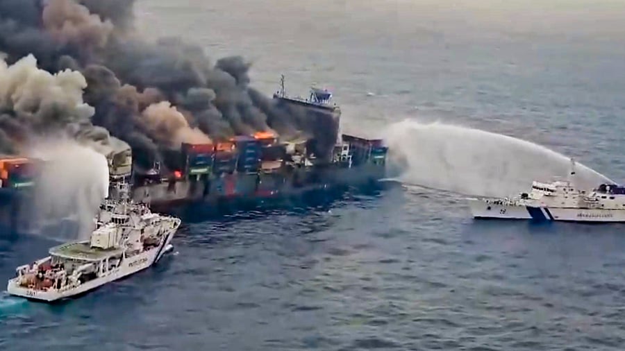 <div class="paragraphs"><p>The Indian Coast Guard ships carry out the firefighting operation after a fire broke out on a Singapore-flagged ship following a container explosion off the Kerala coast, Tuesday, June 10, 2025.</p></div>