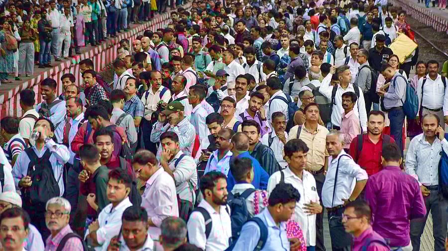 <div class="paragraphs"><p>Passengers wait to board local trains amid a massive rush. Image for representational purposes.</p></div>