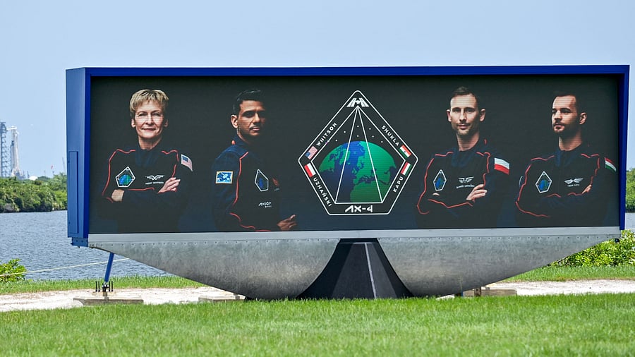 <div class="paragraphs"><p>Axiom-4 astronauts, commander Peggy Whitson of U.S., pilot Shubhanshu Shukla of India, mission specialist Slawosz Uznanski-Wisniewski of Poland and mission specialist Tibor Kapu of Hungary, are pictured on the countdown video clock, as the SpaceX Falcon 9 rocket stands at Launch Complex 39-A after a delay of its mission to the International Space Station, in Cape Canaveral, Florida, U.S., June 9, 2025. </p></div>