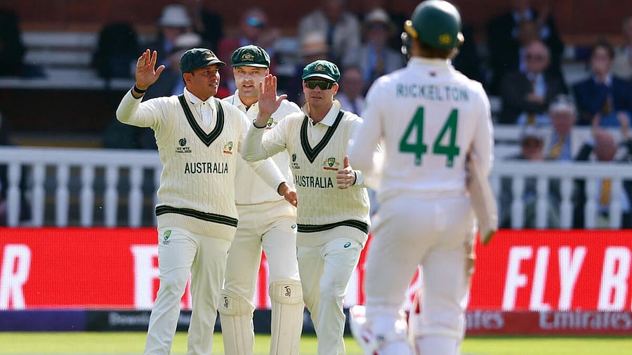 <div class="paragraphs"><p>Australia's Usman Khawaja celebrates taking a catch to dismiss South Africa's Ryan Rickelton.</p></div>