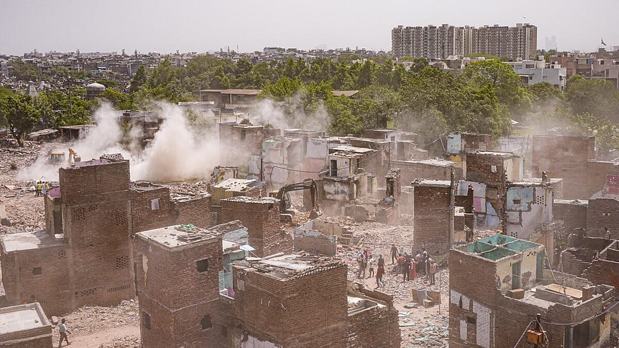 <div class="paragraphs"><p>Demolition of illegal structures under way during an anti-encroachment drive conducted by Delhi Development Authority in the Govindpuri area of south Delhi</p></div>