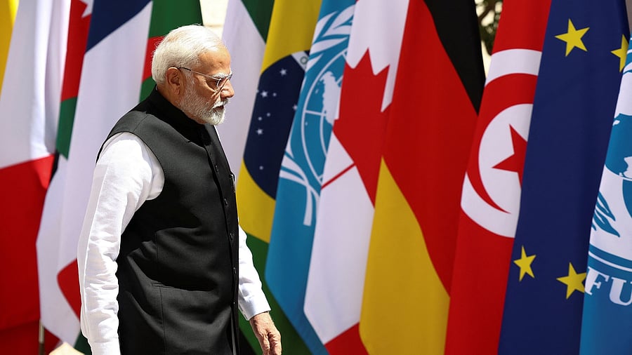 <div class="paragraphs"><p>File Photo: India's Prime Minister Narendra Modi walks on the second day of the G7 summit, at the Borgo Egnazia resort, in Savelletri, Italy June 14, 2024. </p></div>