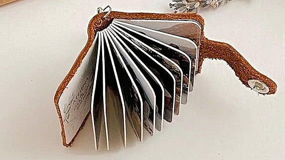 A photo album keychain.