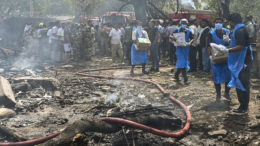 <div class="paragraphs"><p>Rescue and relief work underway after an Air India plane crashed moments after taking off from the airport, in Ahmedabad, Thursday, June 12, 2025. The London-bound plane was carrying 242 passengers.</p></div>