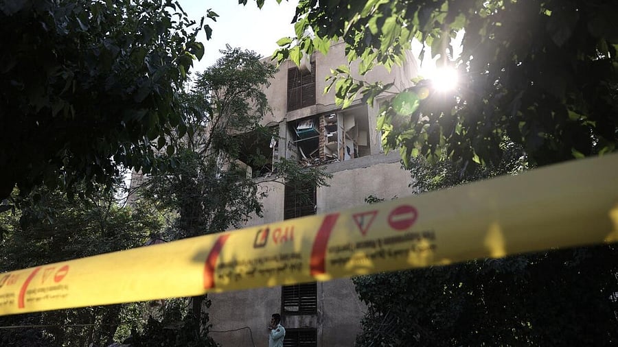<div class="paragraphs"><p>A building stands damaged in the aftermath of Israeli strikes in Tehran.</p></div>