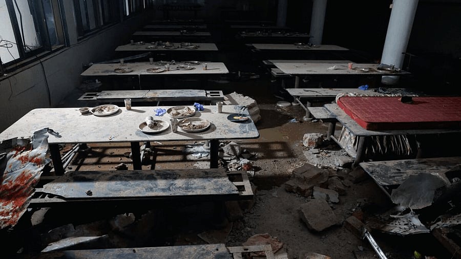 <div class="paragraphs"><p>Lunch plates abandoned, plane parts embedded in walls after Air India jet hit doctors' hostel</p></div>