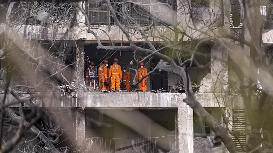 <div class="paragraphs"><p>NDRF personnel at the site of the Air India plane crash</p></div>