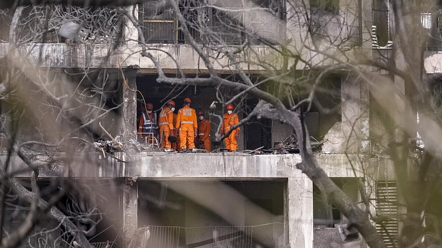 <div class="paragraphs"><p>NDRF personnel at the site of the Air India plane crash, in Ahmedabad.</p></div>