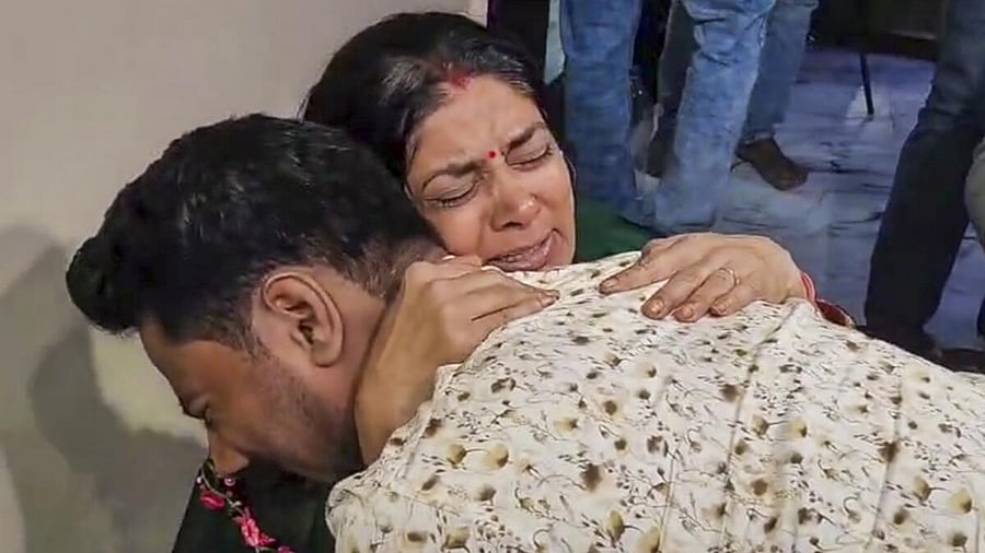 <div class="paragraphs"><p>Govind Raghuvanshi, brother of Sonam Raghuvanshi who is among the five arrested for the murder of her husband Raja Raghuvanshi, consoles Raja's mother Uma Raghuvanshi during a visit at the latter's residence, in Indore, Wednesday, June 11, 2025. Govind came out in support of the victim's family and vowed to fight a legal battle to get justice for them. </p></div>