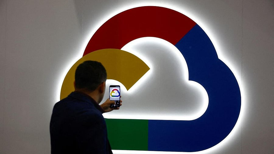 <div class="paragraphs"><p>A person takes a photo of the Google Cloud logo.</p></div>