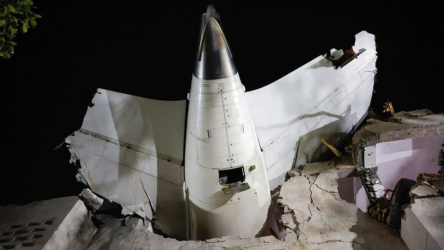 <div class="paragraphs"><p>A view shows the wreckage of the tail section of an Air India aircraft, bound for London's Gatwick Airport, which crashed during take-off from an airport in Ahmedabad, India June 12, 2025.</p></div>