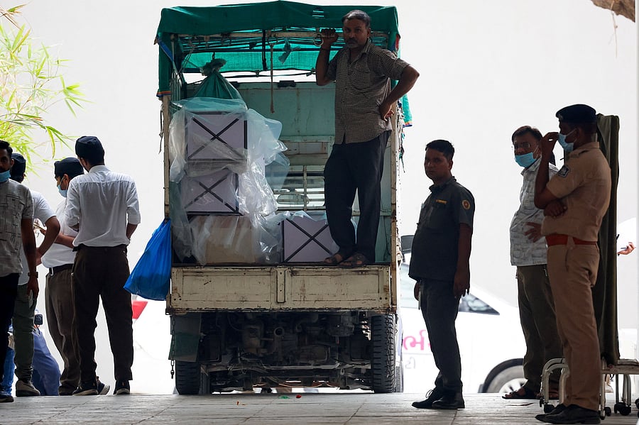 <div class="paragraphs"><p>A worker stands inside a vehicle carrying coffins. (Representational Image)</p></div>