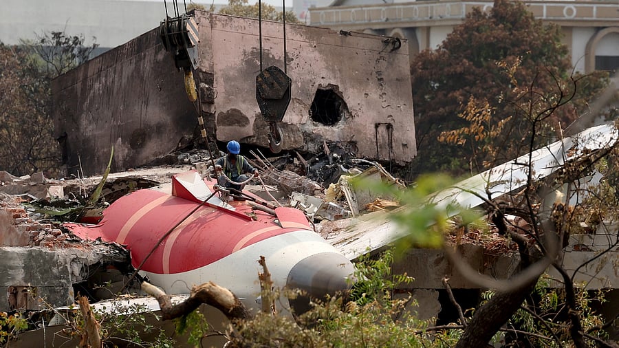 <div class="paragraphs"><p>A man prepares to remove the wreckage of the Air India Boeing (BA.N) 787-8 Dreamliner aircraft, which crashed during take-off from an airport, in Ahmedabad, India June 14, 2025. </p></div>