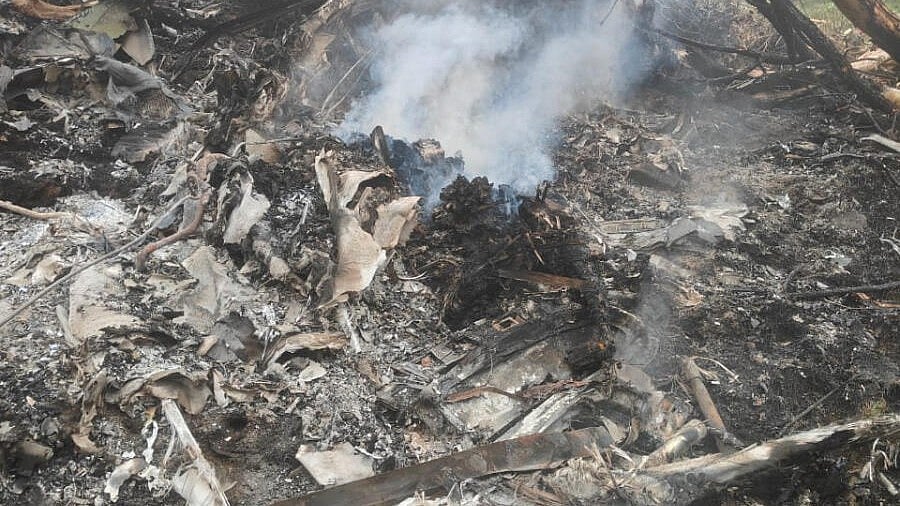 <div class="paragraphs"><p>Smoke billows at the site of a chopper crash in the Gaurikund area of the northern Indian state of Uttarakhand, India, June 15, 2025.</p></div>