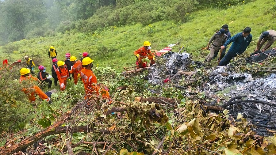 <div class="paragraphs"><p>NDRF personnel at the spot after a helicopter crashed near the Kedarnath shrine, in Rudraprayag district, Uttarakhand</p></div>