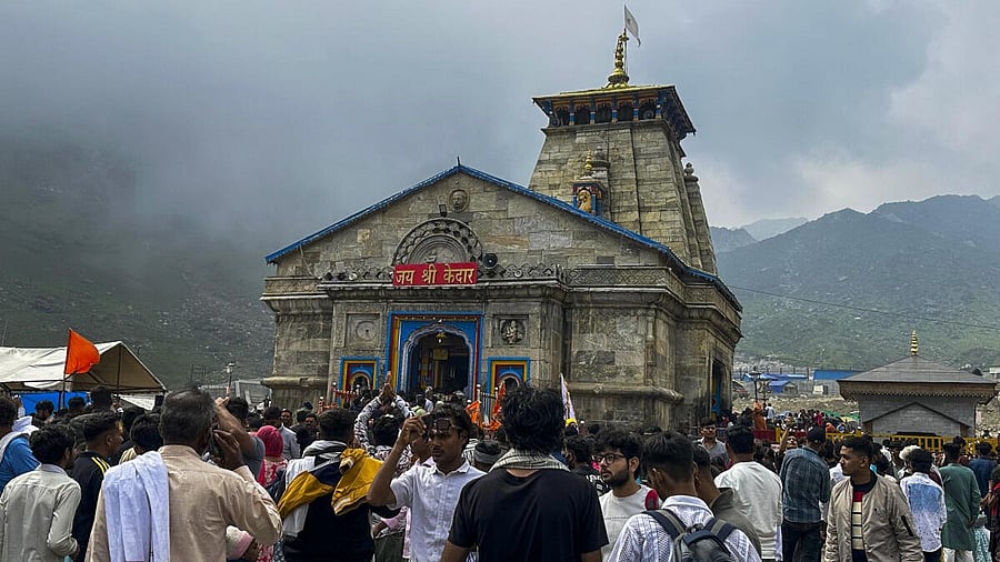 <div class="paragraphs"><p>Rudraprayag: People arrive to offer prayers at the Kedarnath temple, in Rudraprayag district, Uttarakhand, Sunday, June 15, 2025.</p></div>