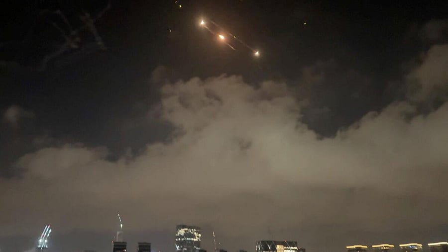 <div class="paragraphs"><p>Rockets light up the sky in Tel Aviv, Israel, June 15, 2025, in this screengrab obtained from a social media video. </p></div>