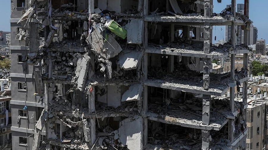 <div class="paragraphs"><p>A building stands damaged following a missile attack from Iran, in Bat Yam, Israel, June 15, 2025.</p></div>