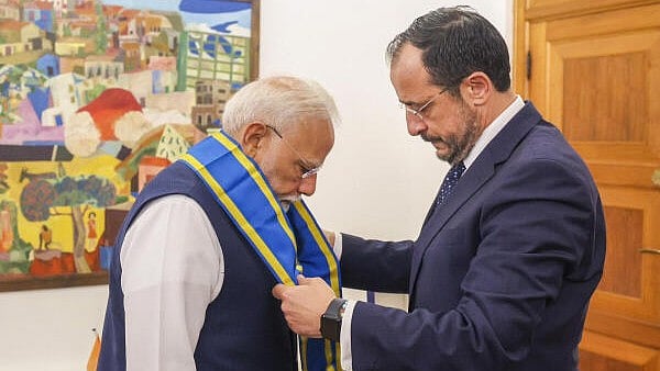 <div class="paragraphs"><p>Prime Minister Narendra Modi being felicitated with Cyprus' highest honour 'Grand Cross of the Order of Makarios III' by President Nikos Christodoulides, in Cyprus.</p></div>