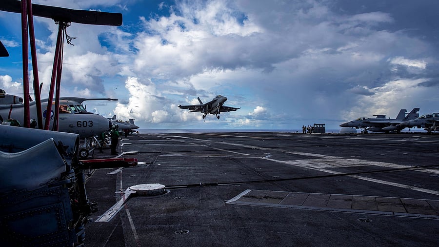 <div class="paragraphs"><p>An F/A-18F Super Hornet, assigned to Strike Fighter Squadron  41, prepares to make an arrested landing on the flight deck of the US Navy Nimitz-class aircraft carrier USS Abraham Lincoln in the Pacific Ocean August 10, 2024.  </p></div>