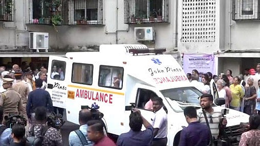 <div class="paragraphs"><p>People gather as the mortal remains of Captain Sumeet Sabharwal, pilot of the Air India plane which crashed in Ahmedabad last week, are brought to Mumbai.</p></div>