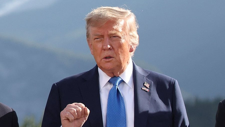 <div class="paragraphs"><p>US President Donald Trump gestures as he attends a family photo session during the G7 Summit, in Kananaskis, Alberta, Canada, June 16, 2025. </p></div>