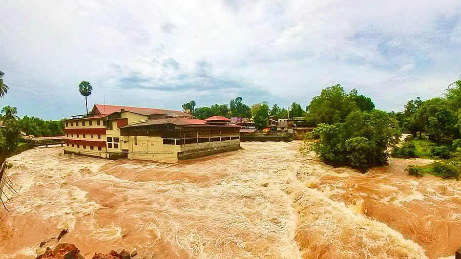 <div class="paragraphs"><p>Kateel Durgaparameshwari Temple appears picturesque against the backdrop of overflowing Nandini river due to heavy rainfall in Dakshina Kannada district. DH Photo/ Fakruddin H </p></div>
