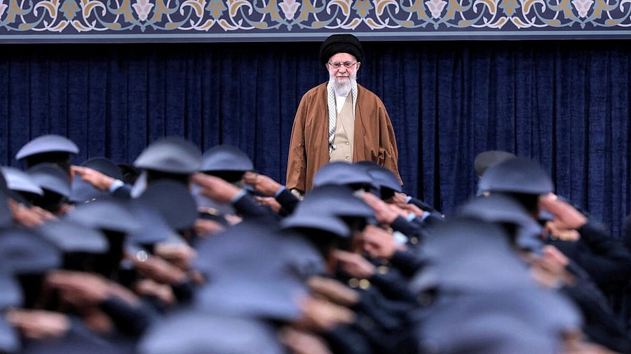 <div class="paragraphs"><p>Iran's Supreme Leader Ayatollah Ali Khamenei listens to the national anthem as Air Force officers salute during their meeting in Tehran</p></div>