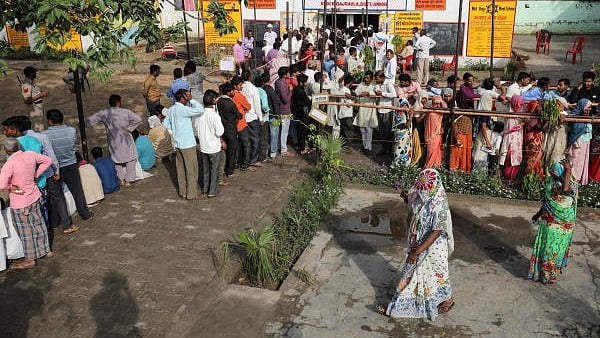 <div class="paragraphs"><p>Voters line up to cast their votes outside a polling station. (Representative image)</p></div>